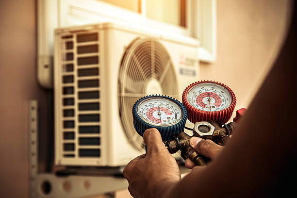 Professional Heat Pump Repair technician working in Plainfield, CT